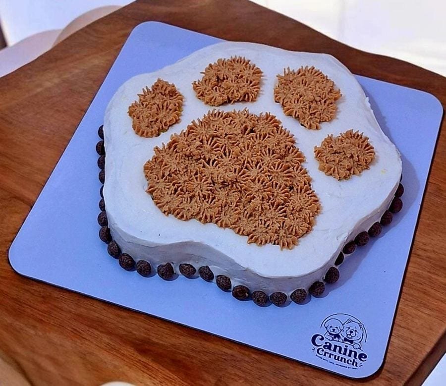 Paw-shaped dog cake by Canine Crrunch